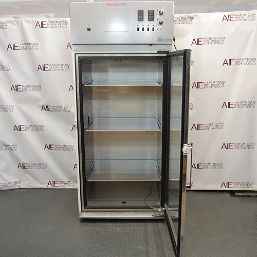 An interior view of an open-door Thermo Forma 3940 refrigerated environmental chamber available from American Instrument Exchange, showing the internal shelving.