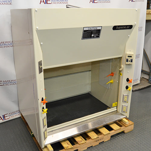 A 4-foot wide Kewaunee Supreme Air chemical fume hood with a solid white color, featuring a black epoxy work surface, standard base cabinets, and control knobs on the sides.