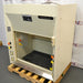 A 4-foot wide Kewaunee Supreme Air chemical fume hood with a solid white color, featuring a black epoxy work surface, standard base cabinets, and control knobs on the sides.
