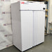 Angled view of a closed LABRepCo Futura LABLD-49-FA double solid-door laboratory freezer showing the front doors, left side panel, and top digital control display.