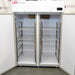 Front view of an open LABRepCo Futura LABLD-49-FA double-door laboratory freezer showing interior adjustable wire shelves and top digital control display.