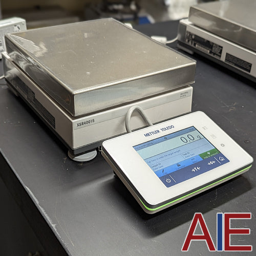 Angled view of Mettler Toledo XSR4001S precision balance showing touchscreen terminal and stainless steel pan