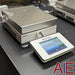 Angled view of Mettler Toledo XSR4001S precision balance showing touchscreen terminal and stainless steel pan