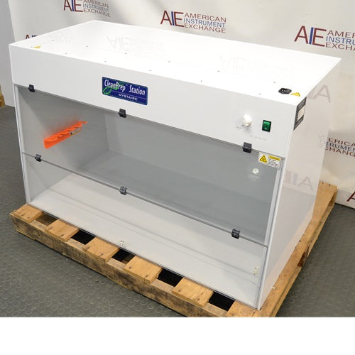 Mystaire CleanPrep Station PCR workstation on a wooden pallet showing the front sash window and interior rack.