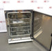 An open front view of a Thermo Heracell VIOS 250i LK CO2 incubator with its outer door swung wide open, revealing the inner glass door, stainless steel interior chamber, and multiple metal shelves inside.