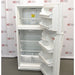 An open-door view of a white VWR general purpose laboratory refrigerator/freezer combo in front of an American Instrument Exchange backdrop, displaying the interior shelving, door bins, and bottom drawers in both the upper freezer and lower refrigerator compartments.