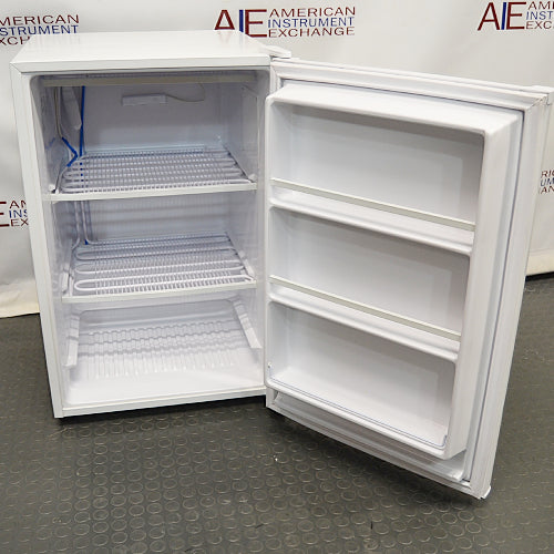 Open interior view of Fisherbrand Isotemp undercounter freezer model 05FFEEFSA showing wire shelving and door storage racks