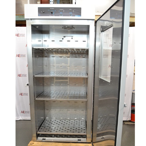 An open interior view of a Shel Lab SCO40 large capacity CO2 incubator available from American Instrument Exchange, showing the stainless steel interior chamber and perforated shelving.