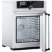 Open Memmert UF55 laboratory oven showing interior stainless steel chamber and SingleDISPLAY control panel