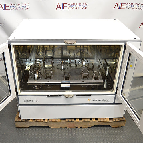 Open Sartorius Stedim Certomat BS-1 incubation shaker showing inner shaking tray with flask clamps