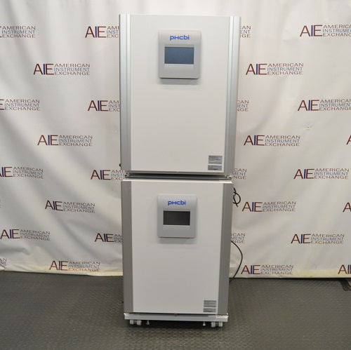 White refrigerator with digital display on a branded backdrop