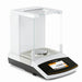 Angled view of a Sartorius Secura SECURA125-1S semi-micro balance showing the front color touchscreen display, white housing, and enclosed glass draft shield chamber with interior weighing pan.