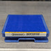 Straight-on close-up studio view of the blue Scienceware Spindrive orbital shaker platform resting on a stainless steel surface, highlighting the front label with branding, model name, catalog number, and caution warning
