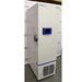 A side-angle view of the white Fisherbrand Isotemp ultra-low temperature freezer showing the handle and blue control panel, positioned in front of an American Instrument Exchange backdrop.