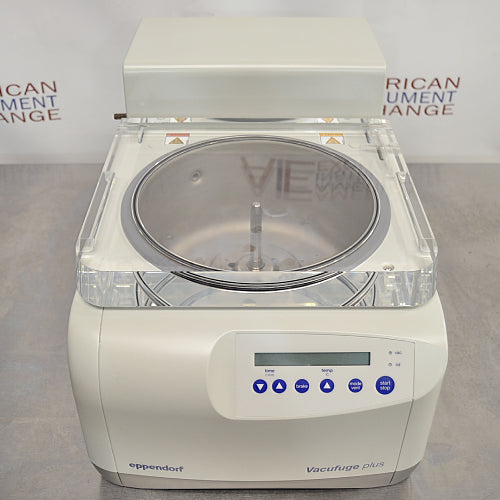 Slight high-angle front view of Eppendorf Vacufuge Plus 5305 centrifugal vacuum concentrator showing central spindle through clear top lid