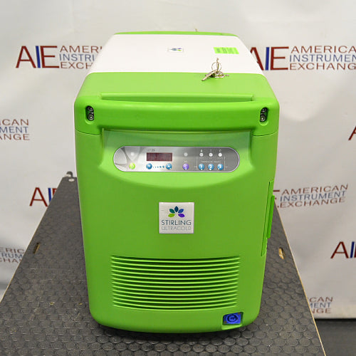 Front view of a Stirling ULT25NEU portable ultralow freezer on a textured surface with a vibrant green and white housing, control panel, and Stirling Ultracold logo.