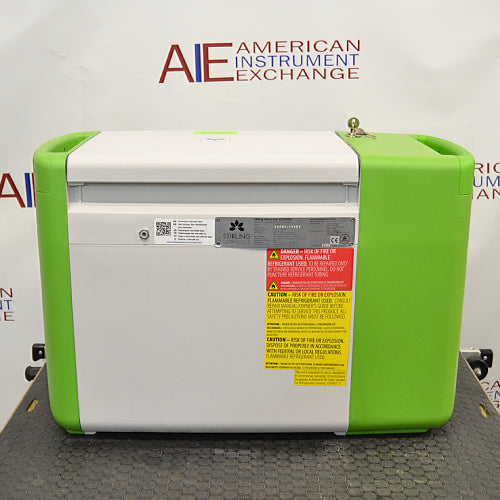 Stirling ULT25NEU portable ultralow freezer on a textured surface with a vibrant green and white housing, control panel, and Stirling Ultracold logo.