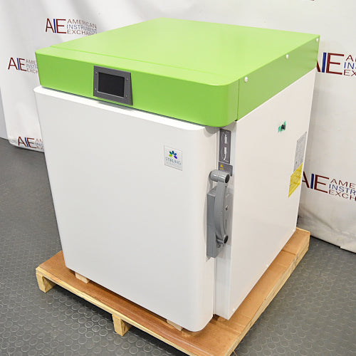 Three-quarter studio view of a Stirling Ultracold SU105UE undercounter ultralow freezer showcasing the heavy-duty latch handle and side panel details on a pallet.