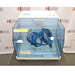 A Willy A. Bachofen TURBULA T2 three-dimensional shaker mixer enclosed in a blue transparent safety housing, positioned in front of an American Instrument Exchange backdrop.
