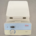 High-angle studio view of a Thermo Scientific Cimarec+ hot plate resting on a metallic work surface, displaying the white ceramic top heating plate, front control panel with digital LED display, and rotary dial