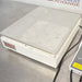 Thermo Scientific MaxQ 2000 Plus CO2-Resistant Orbital Shaker placed on a table, predominantly white in color with the brand 'Thermo' visible on the front, alongside a digital control device.