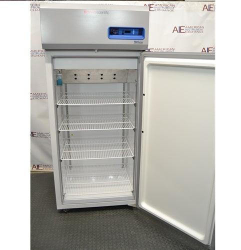 Thermo Scientific TSX Series laboratory freezer with open door showing internal shelves
