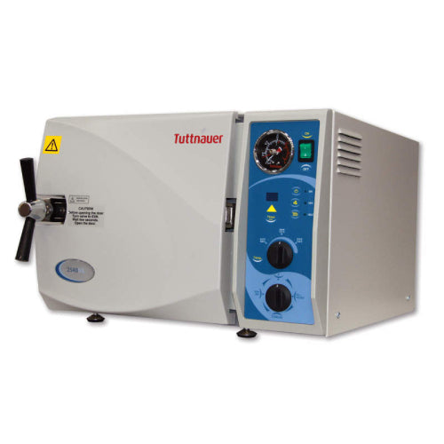 Tuttnauer 2540ML semi-automatic benchtop autoclave, a laboratory sterilization device with a digital display and control knobs on the front panel, in white color with blue accents.