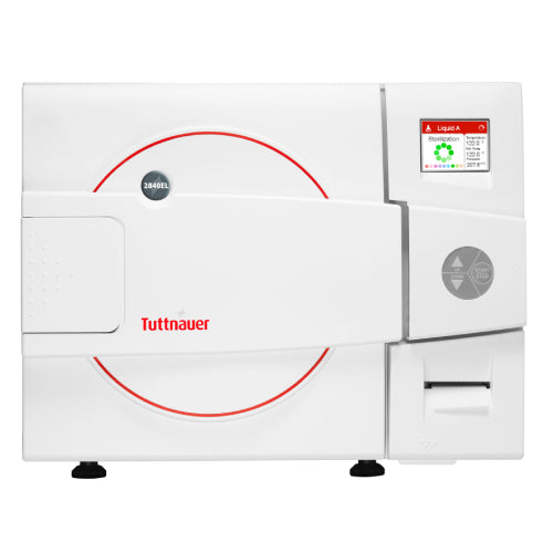 A white Tuttnauer 28L benchtop autoclave with a digital display and control panel.