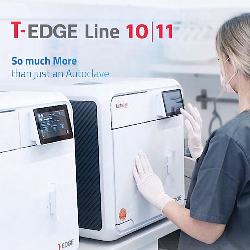 Healthcare professional operating a Tuttnauer T-Edge series autoclave using the digital touchscreen interface in a clinic setting.