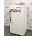 An alternative angled view of a VWR explosion-proof refrigerator available from American Instrument Exchange, showing its solid white exterior door, safety warning labels, and vertical handle.