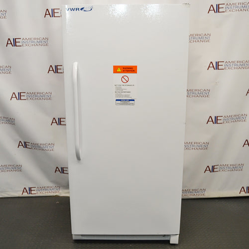 Upright white VWR general purpose laboratory freezer with warning label