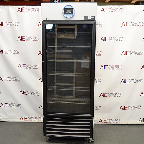 Straight-on studio view of a VWR HCLS-26 upright laboratory refrigerator standing on casters against a branded backdrop, featuring a full-length glass door, top-mounted digital control panel, and lower ventilation louvers