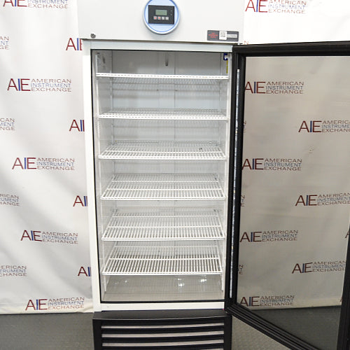 Studio view of the VWR HCLS-26 upright laboratory refrigerator with its glass door swung open, showcasing the interior cabinet fitted with multiple white wire shelves, top digital temperature controller, and louvered base