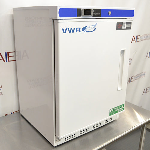 A white VWR undercounter laboratory freezer with a blue stripe on top, featuring a single door and control panel.