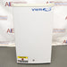 A white VWR undercounter laboratory refrigerator with a blue logo, standing on a floor with 'CAUTION' and 'SERVICE内部使用禁止' stickers on it.