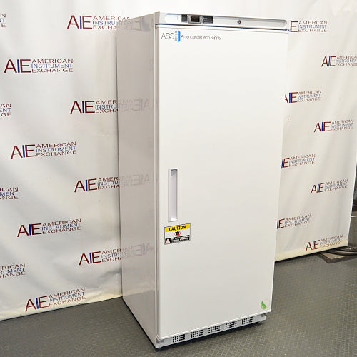 Front angled perspective view of an ABS -20C standard laboratory freezer, showcasing its white cabinet housing, solid locking door with a recessed vertical handle, American Biotech Supply branding, and a bottom ventilation grille