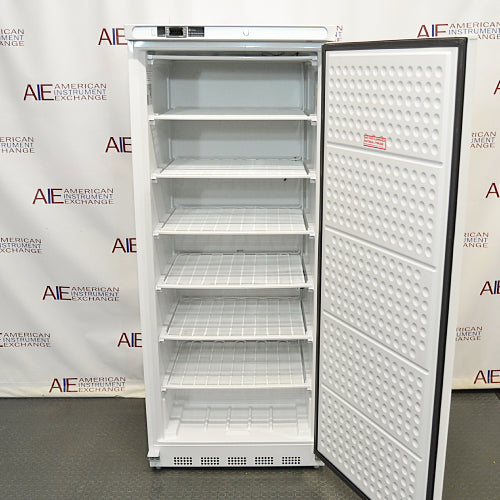 Front view of an ABS -20C standard laboratory freezer with its solid door open, showcasing the interior wire shelving tiers and a textured inner door panel