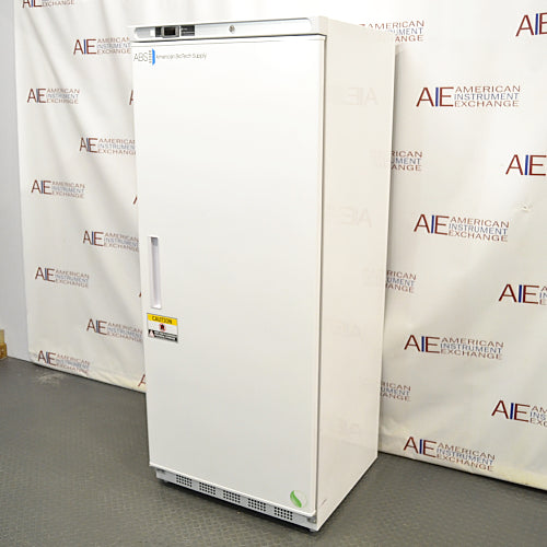 Right angled perspective view of an ABS -20C standard laboratory freezer, showcasing its white cabinet housing, solid locking door with a recessed vertical handle, American Biotech Supply branding, and a bottom ventilation grille