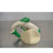 AccuPet AccuHelp motorized pipette controller in white and green resting on a matching desktop charging stand