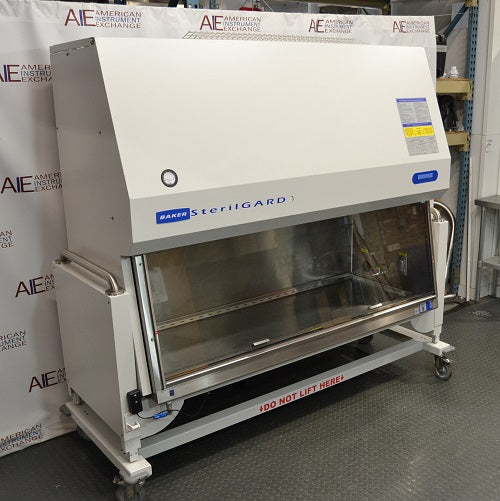 Left angled perspective view of a Baker SterilGARD e3 SG604 biosafety cabinet on a rolling stand displaying the side panel, front glass sash, and upper housing with pressure gauge