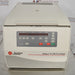 Front eye-level view of a Beckman Coulter Allegra X-22R refrigerated centrifuge, featuring a beige and grey housing, a closed lid, and a digital control panel with programming buttons and LED displays