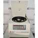 Front eye-level view of a Beckman Coulter Allegra X-22R refrigerated centrifuge with its top lid swung open, revealing the interior rotor chamber loaded with bucket adapters and the front digital control panel