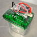 Right angle view of a Bio-Rad Mini-PROTEAN Tetra Cell electrophoresis system, showing the transparent chamber and the green safety lid with warning text and power cables