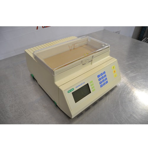 Bio-Rad PROTEAN IEF Cell isoelectric focusing system featuring a beige main housing, slanted front interface panel with digital display screen and keypad, and a transparent top cover chamber