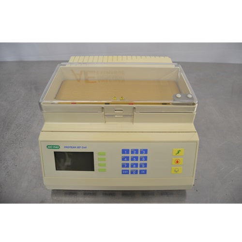 Bio-Rad PROTEAN IEF Cell focused on the front control keypad, digital display screen, and clear hinged lid closing over the upper tray chamber