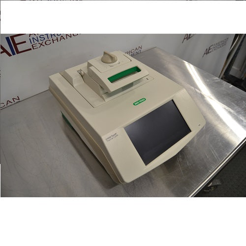 Right angled perspective view of Bio-Rad C1000 Touch thermal cycler with closed lid and touchscreen display control panel