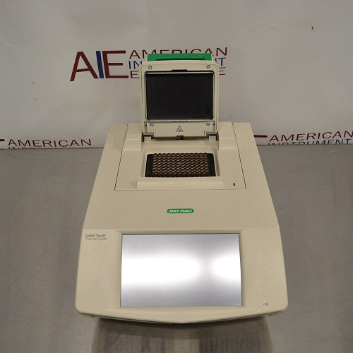 Front perspective view of Bio-Rad C1000 Touch thermal cycler with open 96-deep well reaction module and large touchscreen display