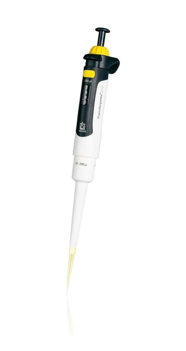 BRANDTECH Transferpette pro single-channel pipette, 20 to 200 uL volume range, white handle with yellow accent plunger and yellow disposable pipette tip attached