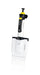 BRANDTECH Transferpette pro 8-channel multichannel pipette, 10 to 100 uL volume range, white handle with yellow accent plunger and clear pipette tips attached