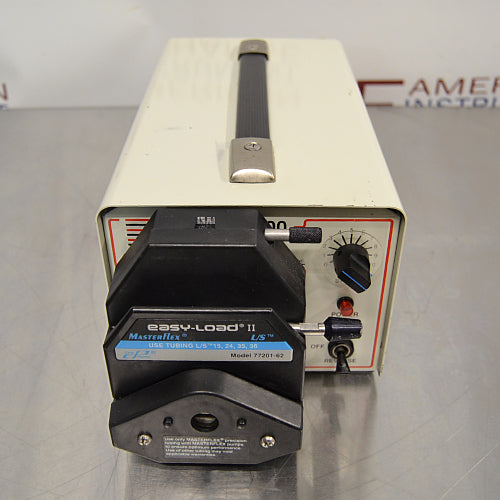 Front product view of a BRL CP-600 peristaltic pump equipped with a Masterflex L/S Easy-Load II 77201-62 pump head, variable speed control dial, power switch, and top carry handle on a lab bench